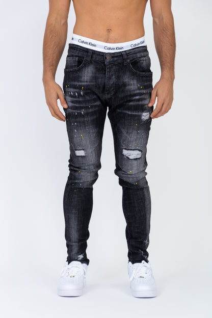 Jean coupe skinny noir peinture