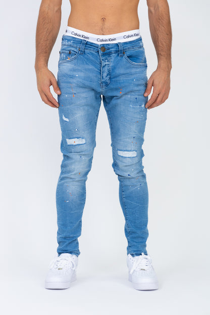 Jean coupe skinny bleu usé