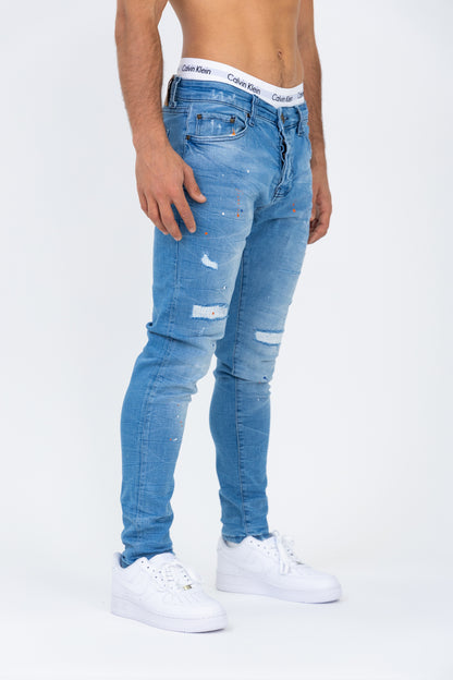 Jean coupe skinny bleu usé
